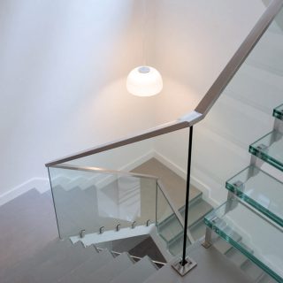 Evolution of Styles and Technological Breakthroughs in Modern Staircase Handrail Design